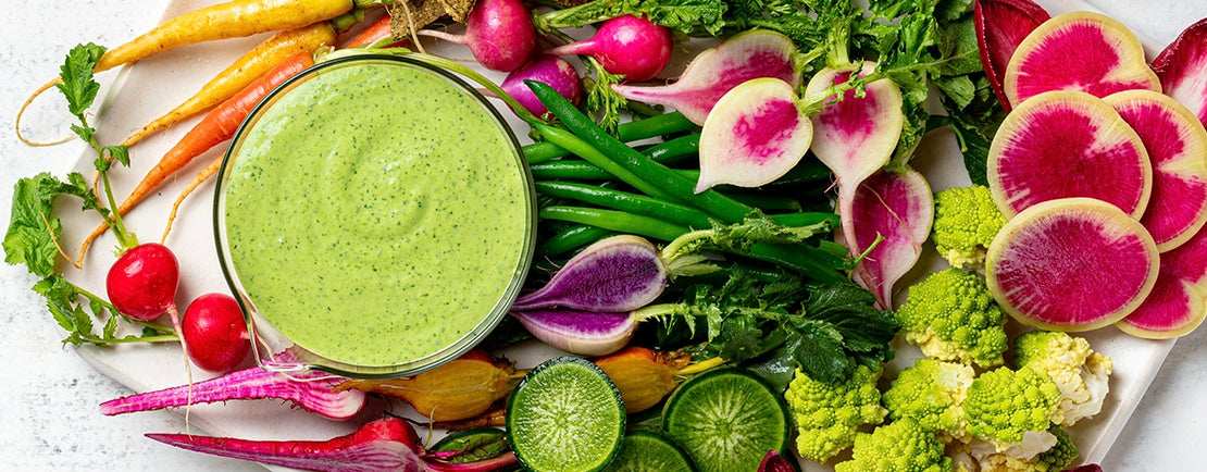 cashew tree with yellow, green and red cashew apples