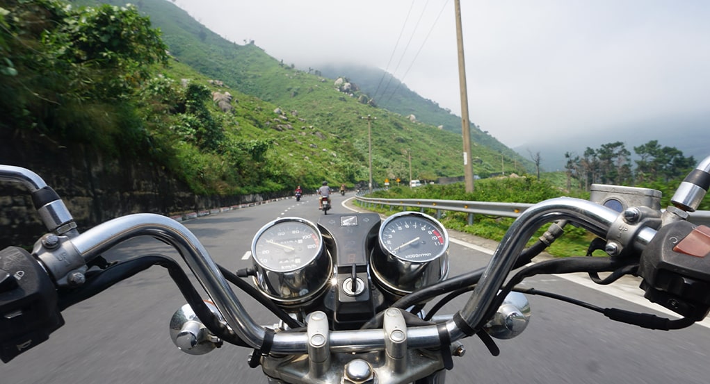 first person perspective on motorcycle of scenic highway