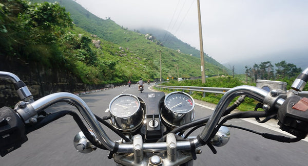first person perspective on motorcycle of scenic highway
