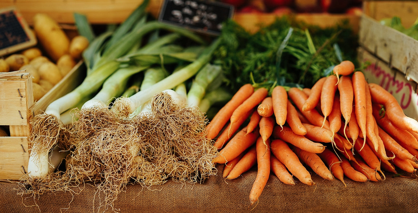 Farmstand organic green onions and carrots