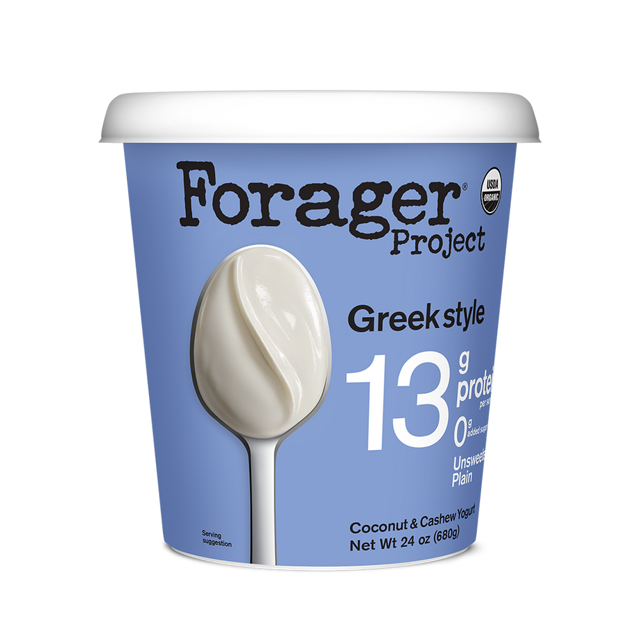 Forager Project Greek style coconut and cashew yogurt container with a spoon and 13g protein label.