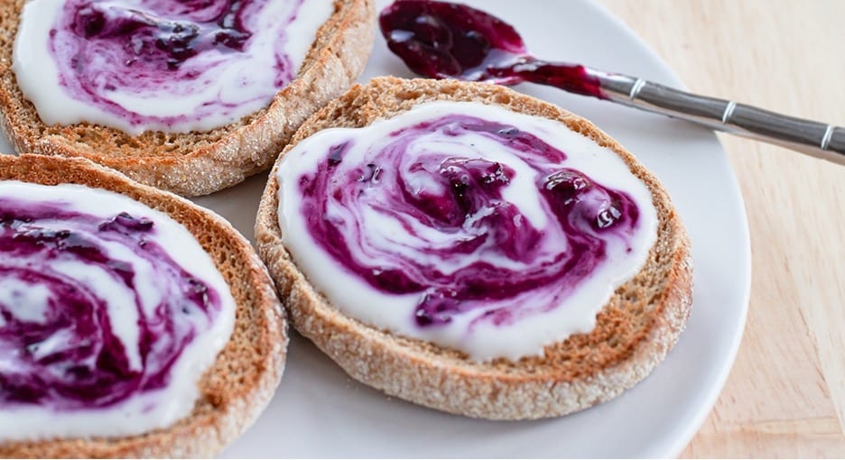 Homemade Blueberry Jam with Yogurt on English Muffins.